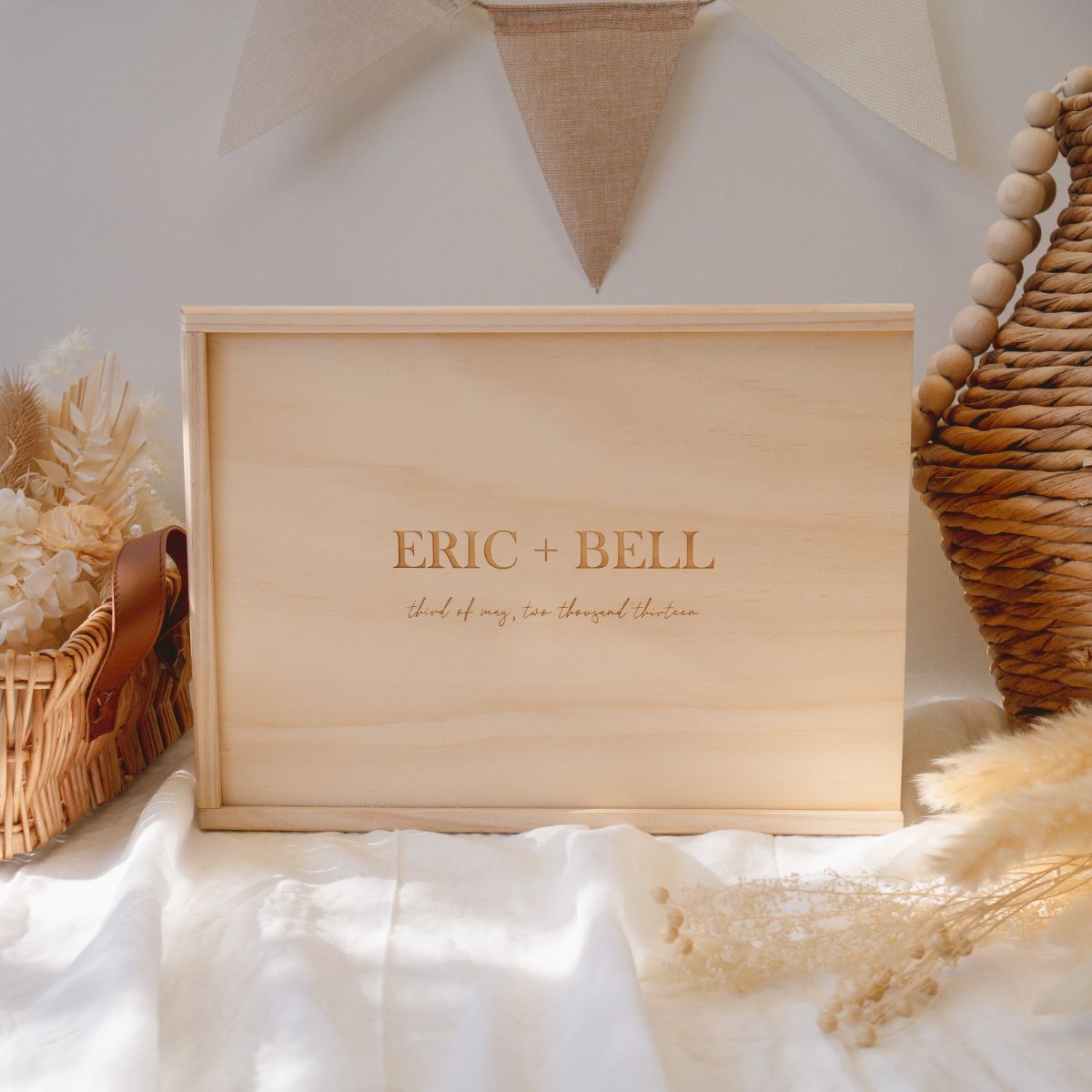 This is a large wooden wedding keepsake box with a plain text design (and plus sign) and a date of the wedding underneath